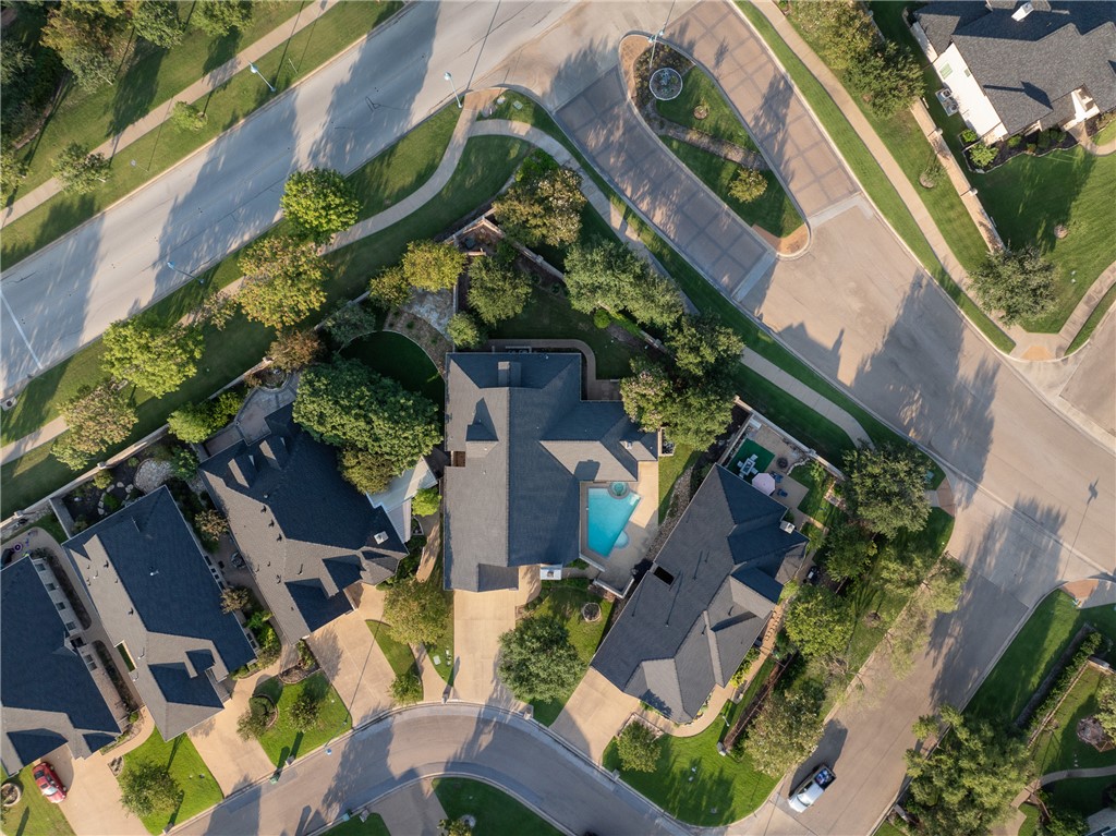 5011 Fairfield Court Bryan, TX 77802 - Photo 45 of 46 an aerial view of a house with a yard and potted plants