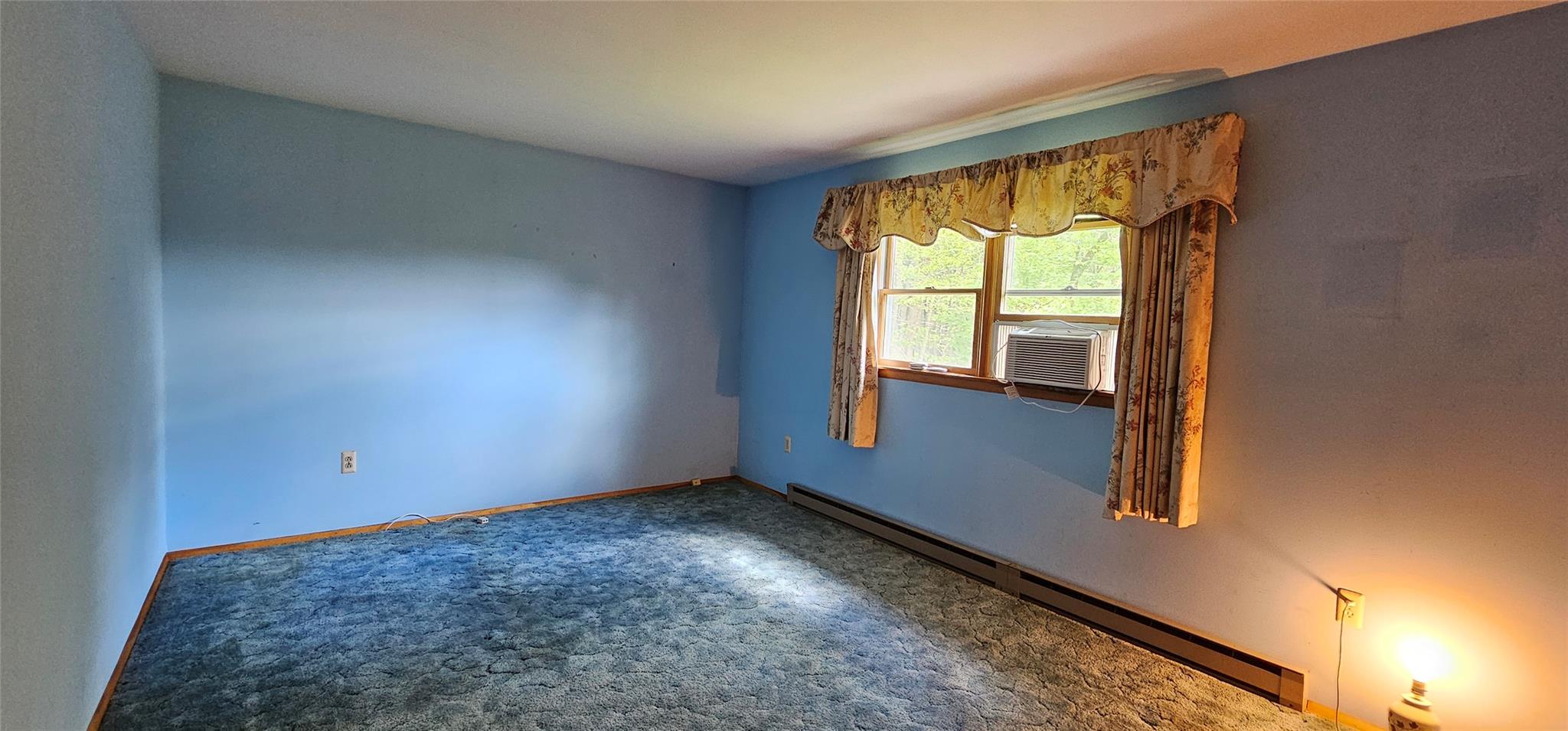 24 Buff Road Cochecton, NY 12726 - Photo 11 of 34 an empty room with a window
