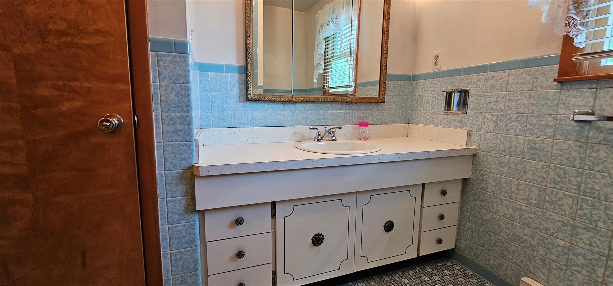 24 Buff Road Cochecton, NY 12726 - Photo 17 of 34 a bathroom with a sink and a mirror