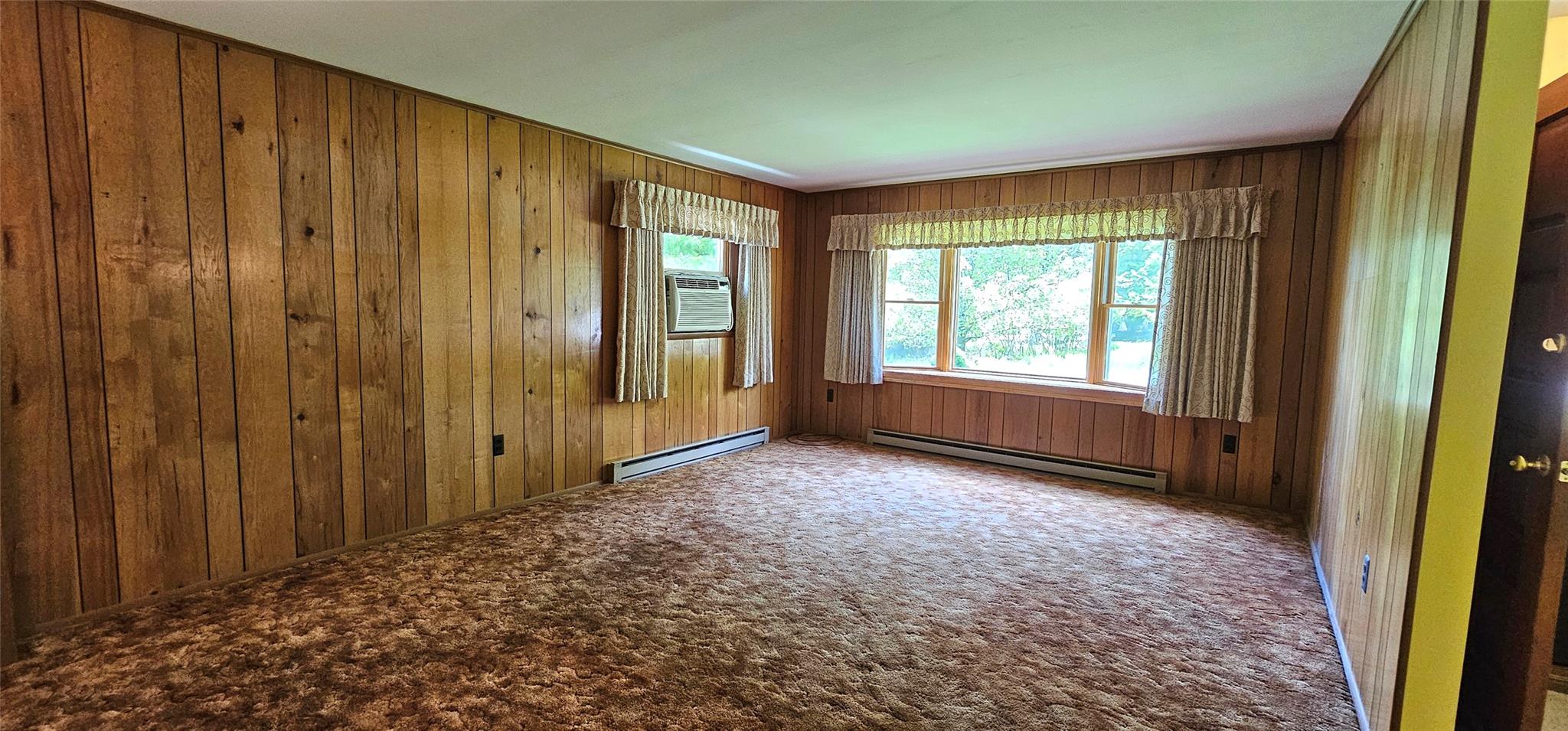 24 Buff Road Cochecton, NY 12726 - Photo 2 of 34 a view of an empty room and window