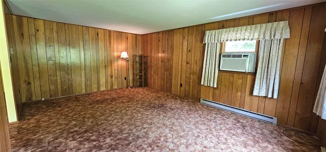 a view of entryway with a front door