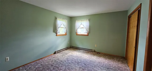 a view of an empty room with window
