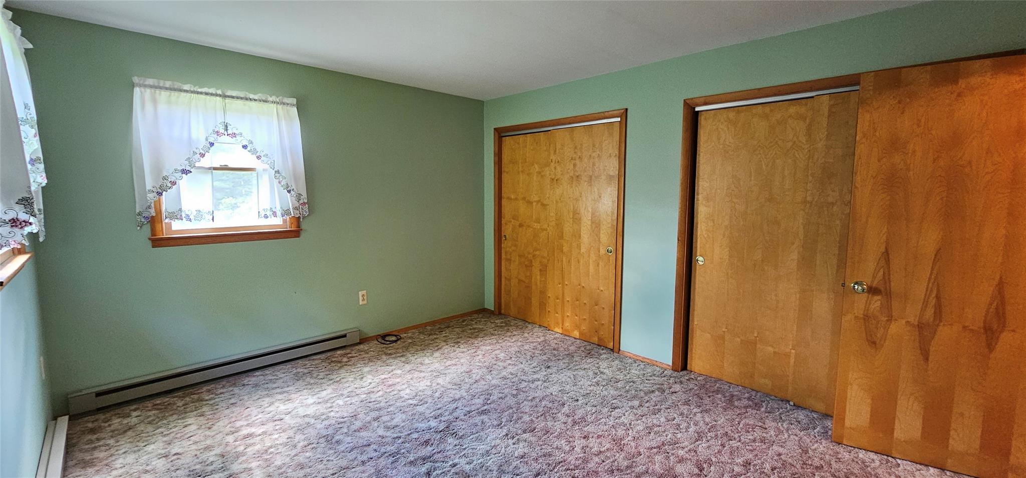 24 Buff Road Cochecton, NY 12726 - Photo 10 of 34 a view of an empty room with window and closet area