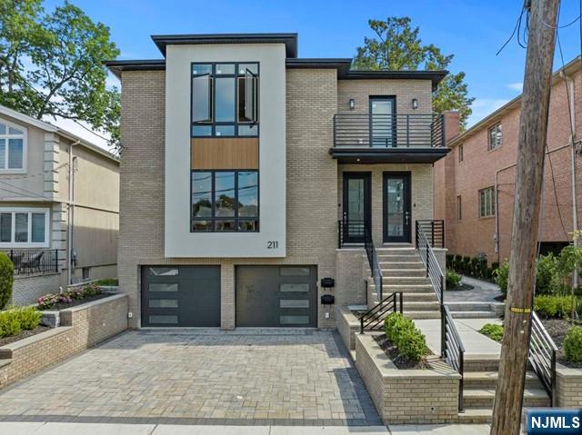211 Warwick Avenue, Unit 1 Fort Lee, NJ 07024 - Photo 1 of 43 a view of house with outdoor space