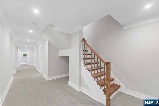 211 Warwick Avenue, Unit 1 Fort Lee, NJ 07024 - Photo 29 of 43 a view of a hallway with staircase
