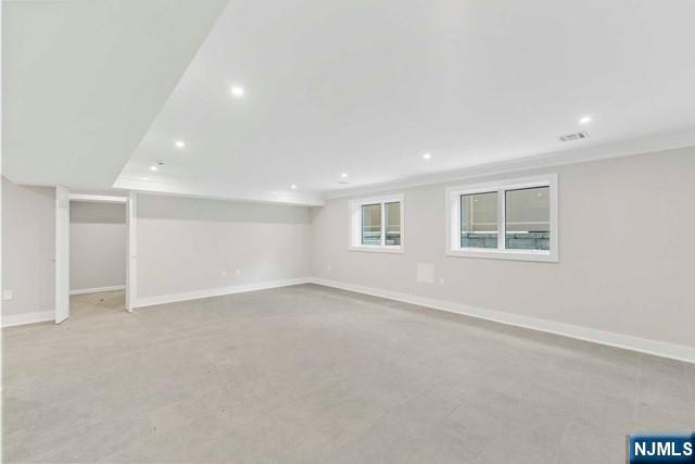 211 Warwick Avenue, Unit 1 Fort Lee, NJ 07024 - Photo 32 of 43 an empty room with windows