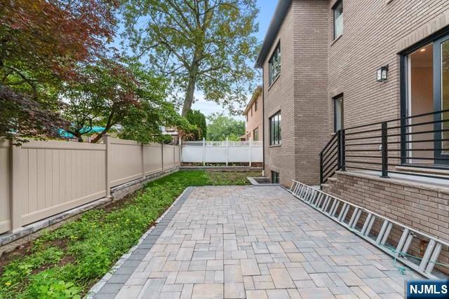 211 Warwick Avenue, Unit 1 Fort Lee, NJ 07024 - Photo 39 of 43 a view of a backyard with pathway