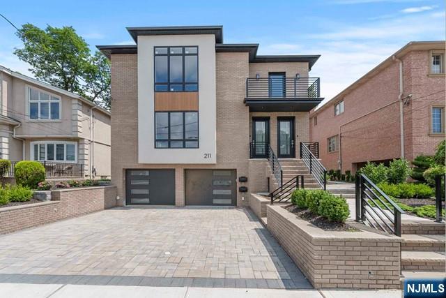 211 Warwick Avenue, Unit 1 Fort Lee, NJ 07024 - Photo 40 of 43 a house view with a outdoor space