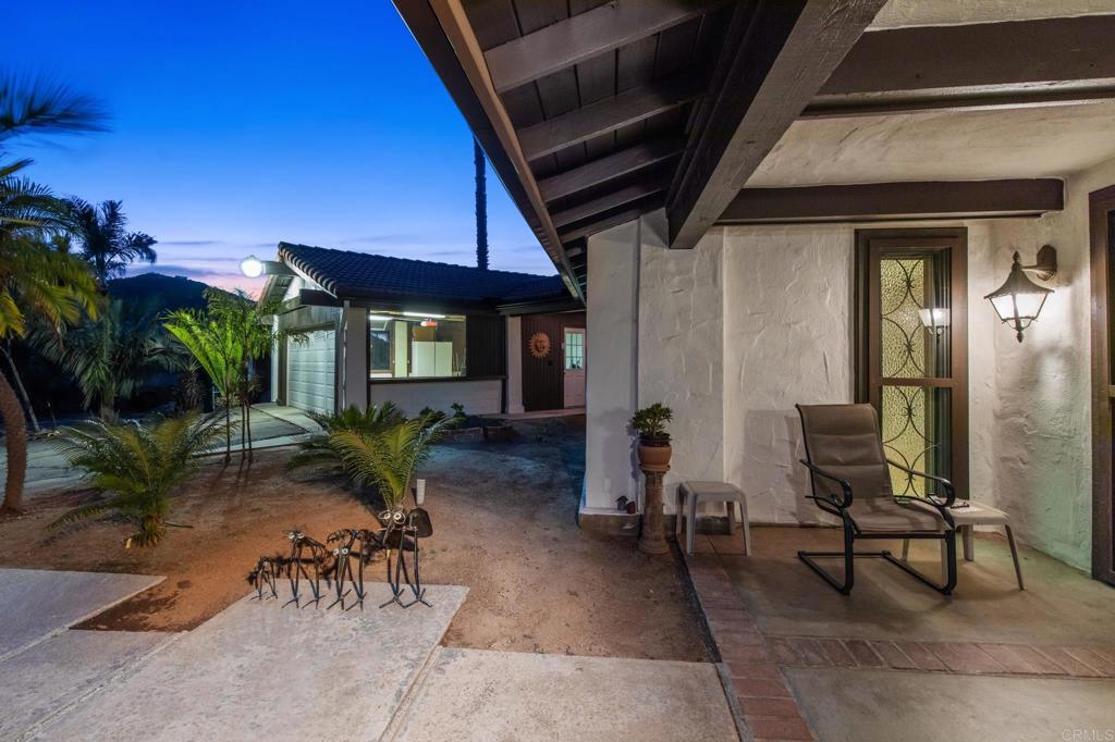 28969 Mountain Meadow Road Escondido, CA 92026 - Photo 14 of 25 a backyard of a house with outdoor seating