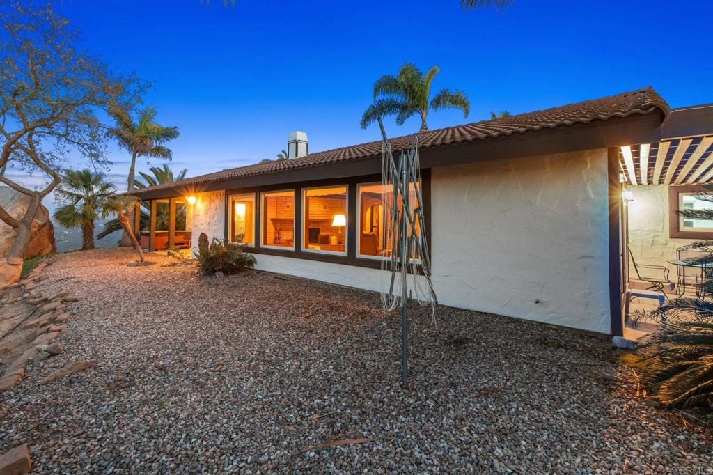 28969 Mountain Meadow Road Escondido, CA 92026 - Photo 8 of 25 a view of a house with a backyard