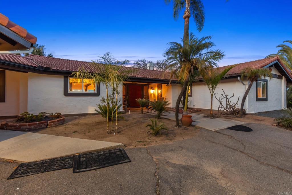 28969 Mountain Meadow Road Escondido, CA 92026 - Photo 9 of 25 a view of a house with a patio