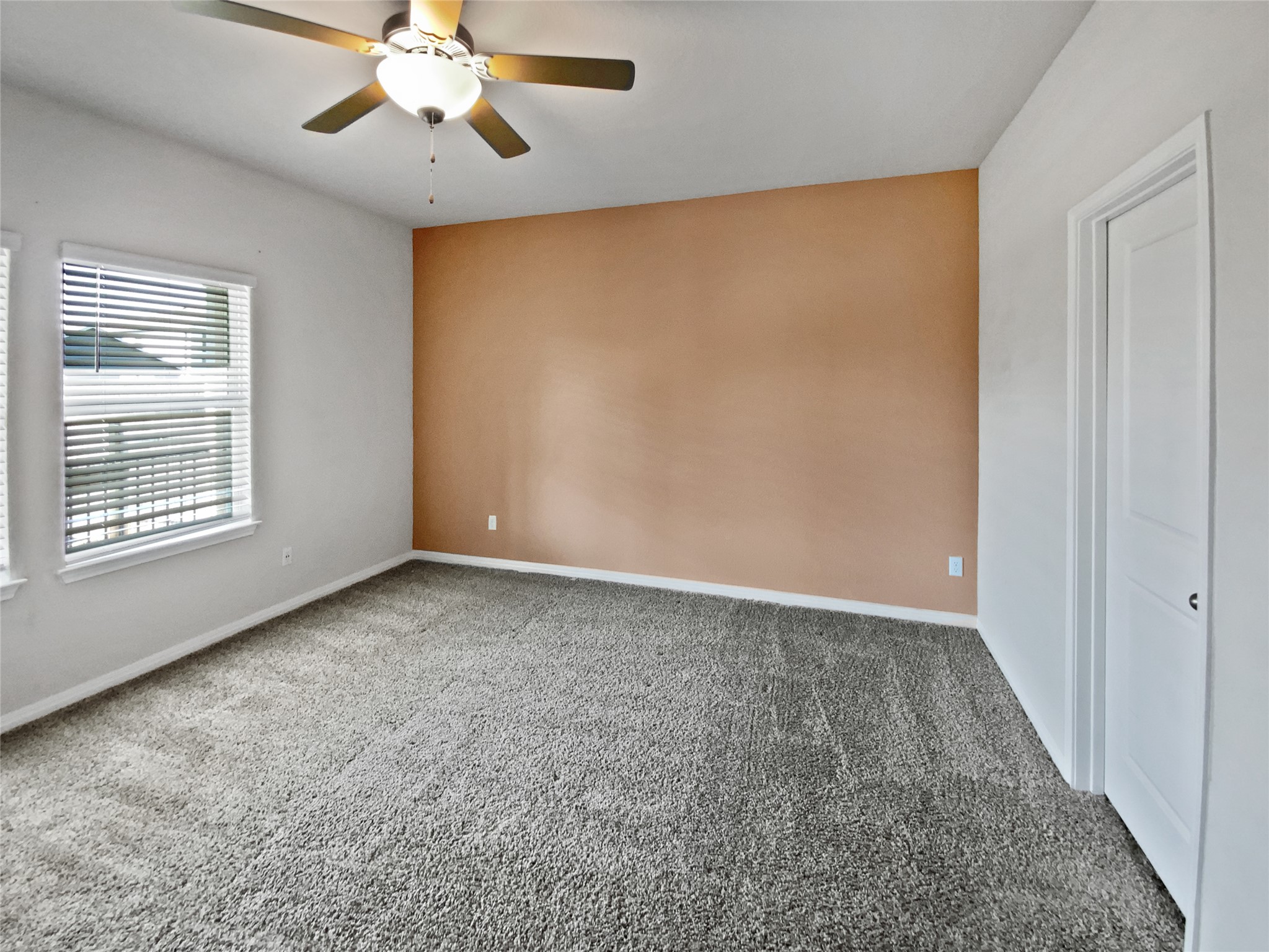 220 Sungrove Trail Georgetown, TX 78628 - Photo 13 of 23 Unfurnished room featuring carpet and ceiling fan