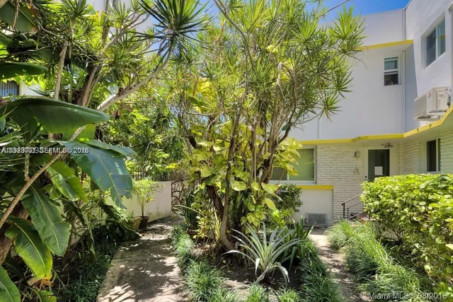 a plant that is in front of a building