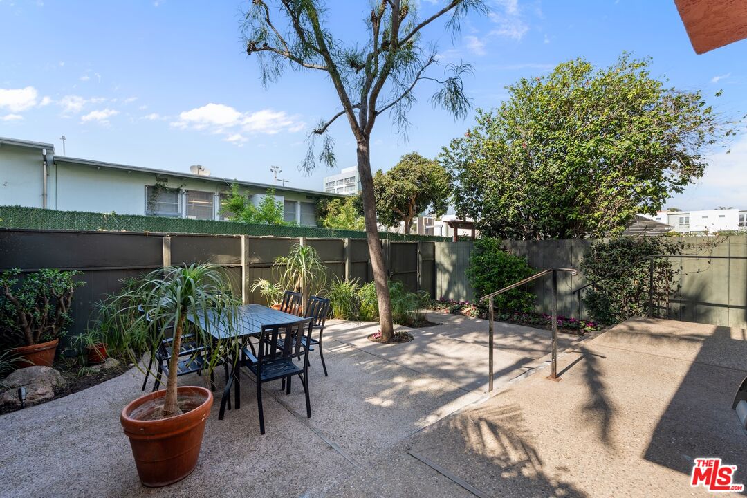 122 Buccaneer Street, Unit 1 Marina del Rey, CA 90292 - Photo 18 of 21 a view of a backyard with sitting area and furniture