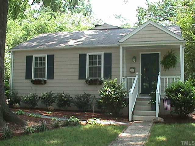 2831 Barmettler Street Raleigh, NC 27607 - Photo 1 of 1 a front view of a house with a yard