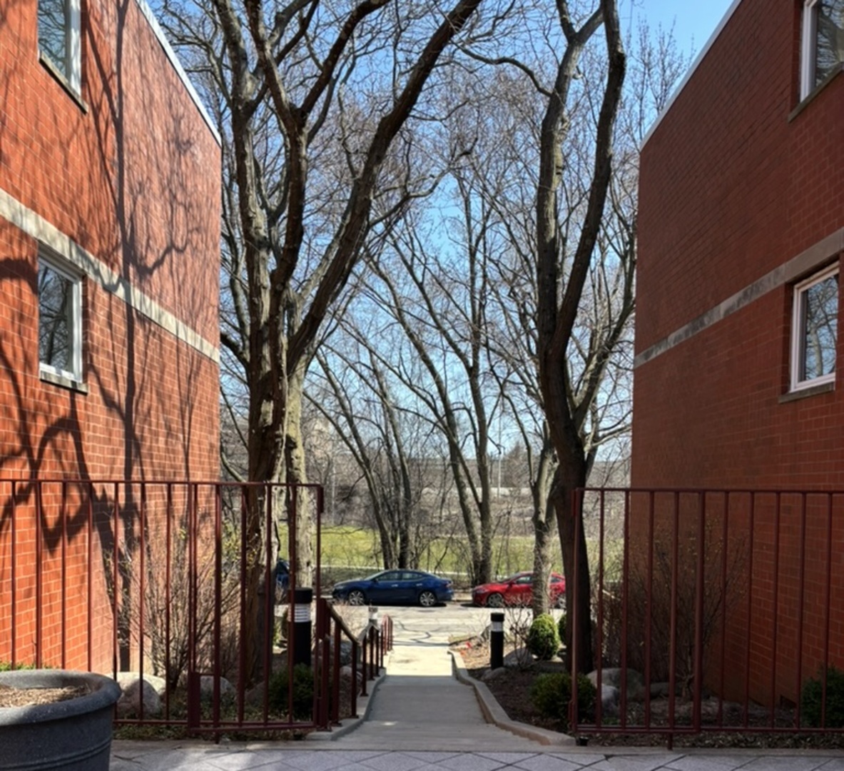 1229 Central Street, Unit A Evanston, IL 60201 - Photo 11 of 14 a view of street with parked on road