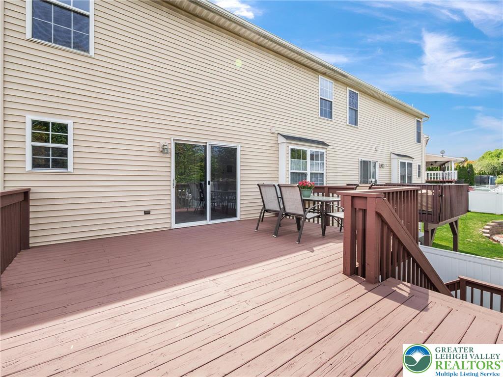 2309 Juniper Drive Coplay, PA 18037 - Photo 17 of 49 a view of a house with wooden deck and furniture