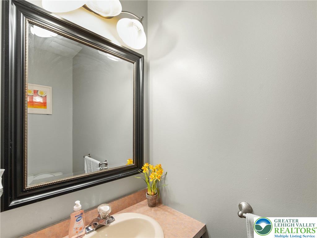 2309 Juniper Drive Coplay, PA 18037 - Photo 36 of 49 a bathroom with a sink and a mirror