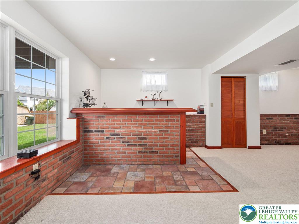 2309 Juniper Drive Coplay, PA 18037 - Photo 39 of 49 a view of kitchen with kitchen island a counter top space a sink and appliances