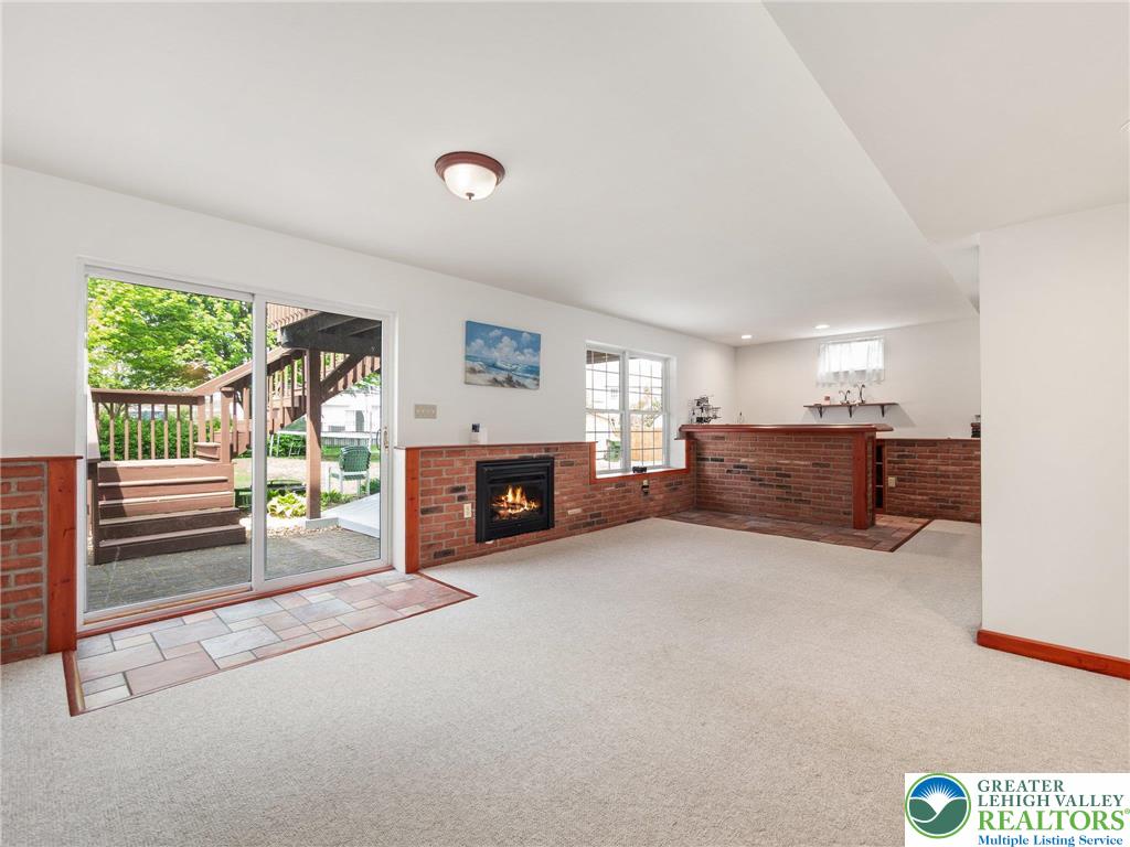 2309 Juniper Drive Coplay, PA 18037 - Photo 40 of 49 a living room with furniture and a fireplace