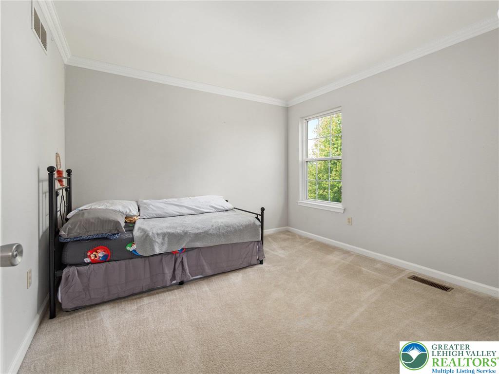 2309 Juniper Drive Coplay, PA 18037 - Photo 44 of 49 a bedroom with a bed and window