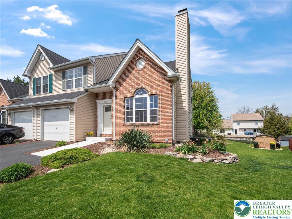 2309 Juniper Drive Coplay, PA 18037 - Photo 7 of 49 a view of a house with a yard and plants