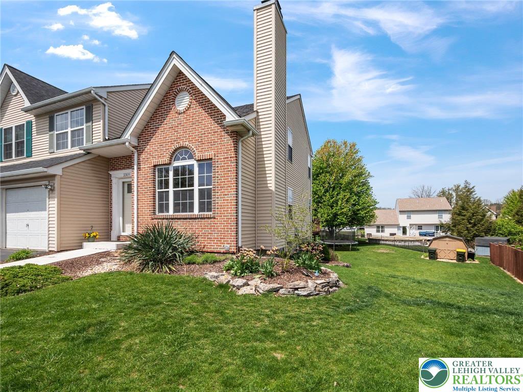 2309 Juniper Drive Coplay, PA 18037 - Photo 9 of 49 a front view of a house with a yard