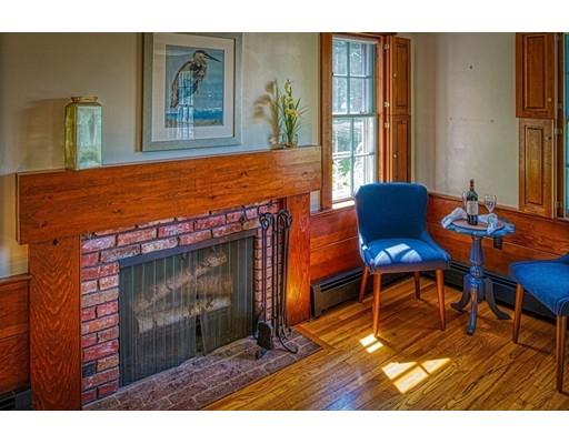 10 Batchelder Road Marblehead, MA 01945 - Photo 8 of 23 a view of a livingroom with furniture and a fireplace