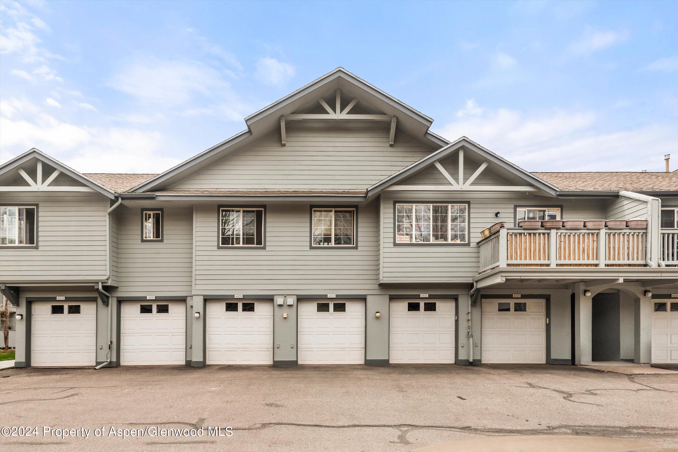 4202 Elk Lane Basalt, CO 81621 - Photo 15 of 15 a front view of a house with a garden
