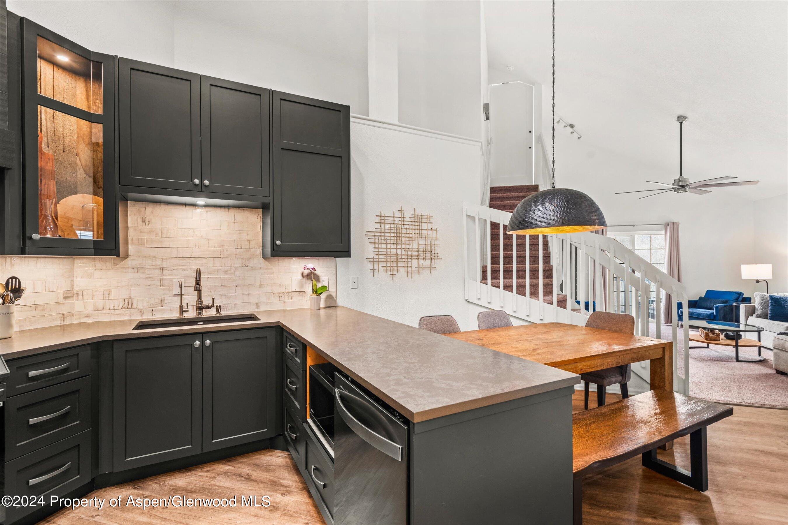 4202 Elk Lane Basalt, CO 81621 - Photo 4 of 15 a kitchen with a sink a stove and cabinets