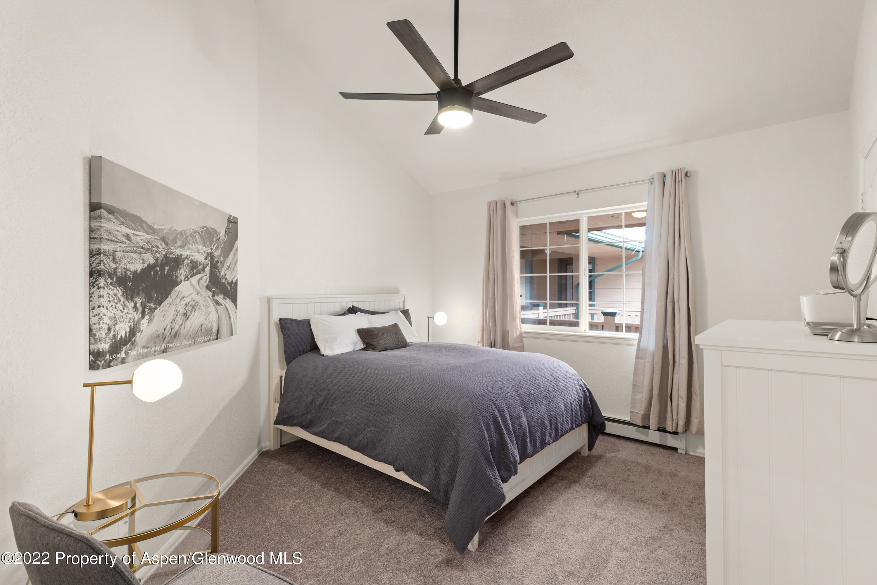 4202 Elk Lane Basalt, CO 81621 - Photo 10 of 15 a bedroom with a bed and a window