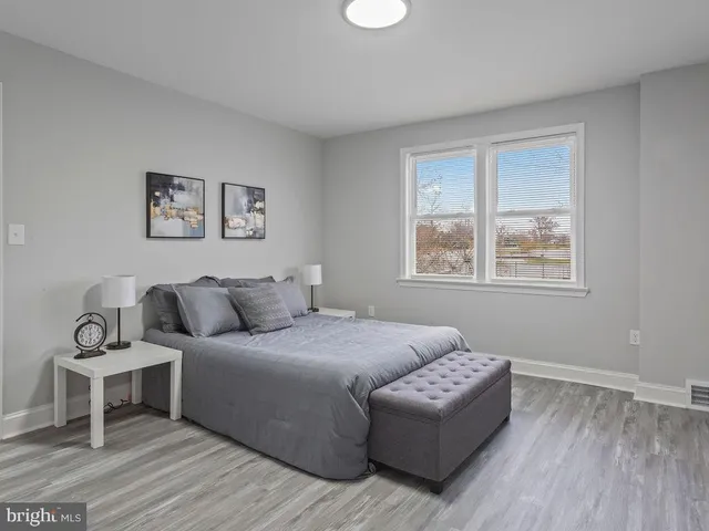 a bathroom with a bathtub and toilet