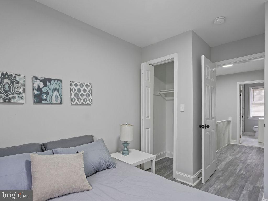 5716 Leith Walk Baltimore, MD 21239 - Photo 20 of 36 a bathroom with a bathtub and toilet