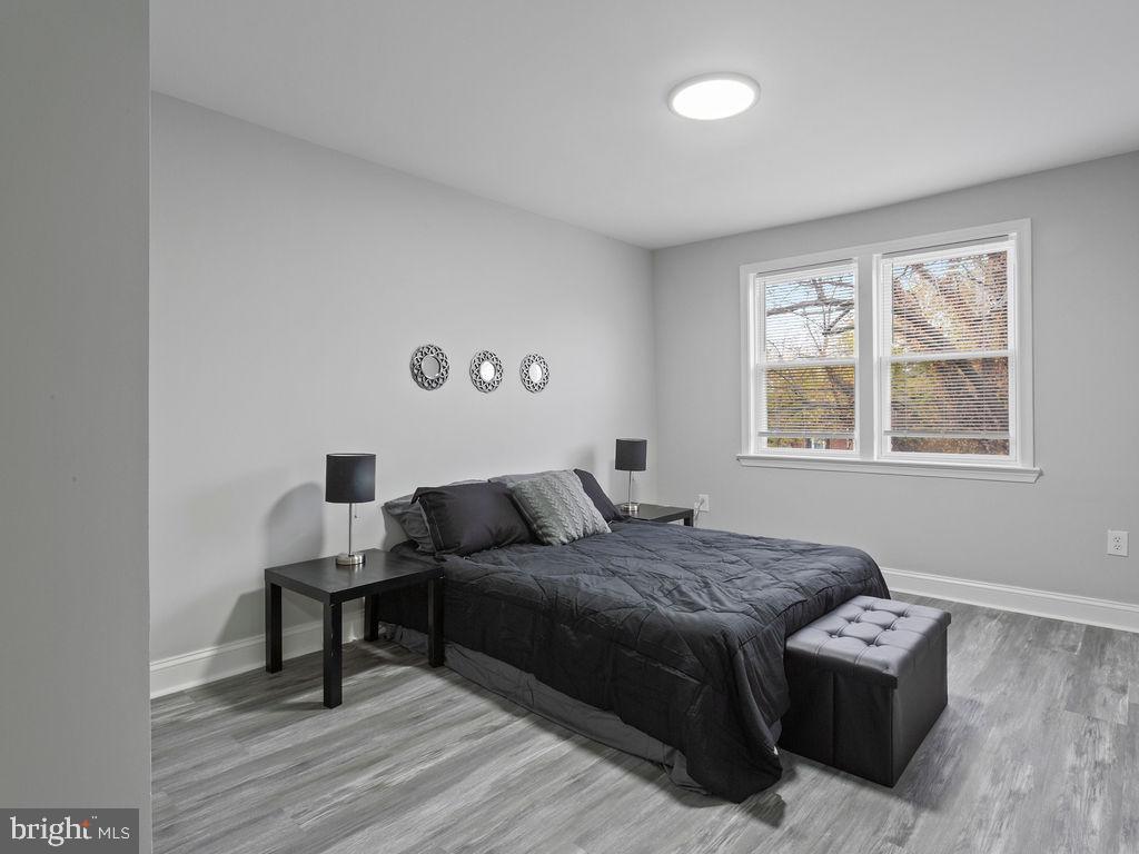 5716 Leith Walk Baltimore, MD 21239 - Photo 21 of 36 a living room with furniture and a window