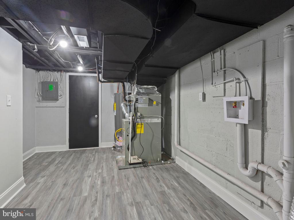 5716 Leith Walk Baltimore, MD 21239 - Photo 31 of 36 a view of empty room with wooden floor