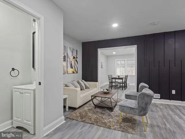 a bedroom with a bed and a lamp