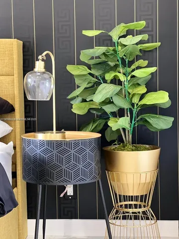 a vase of flowers sitting on a table