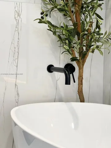 a vase of flowers sitting on a table