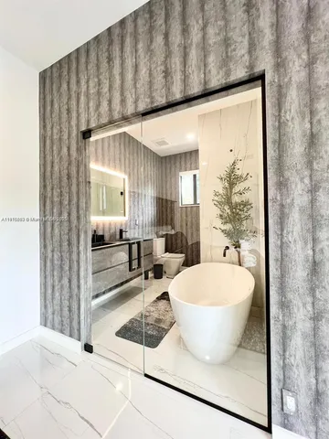 a room with table and chairs