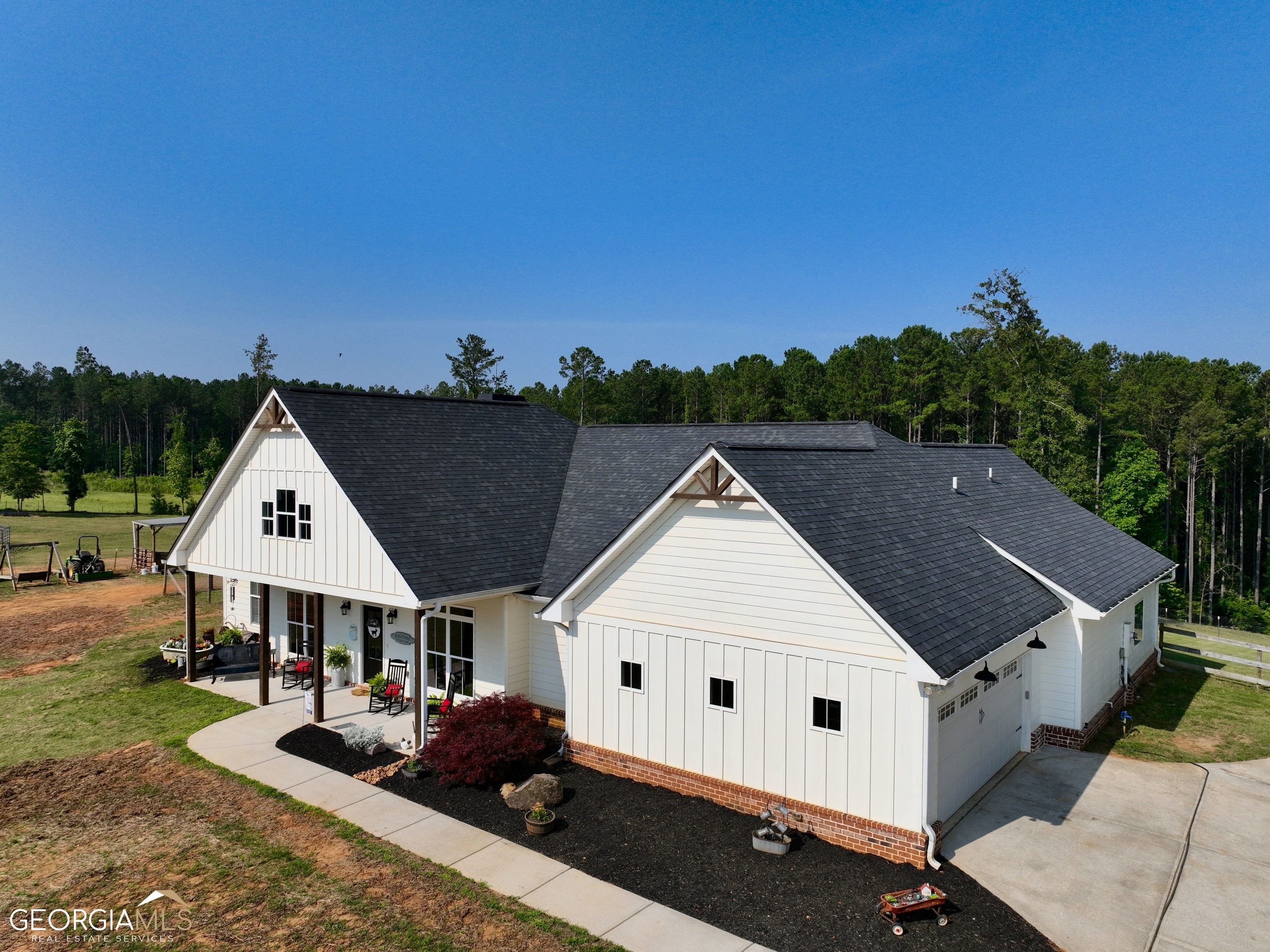 1150 Jackson Lake Road Jackson, GA 30233 - Photo 1 of 1 a aerial view of a house with a yard