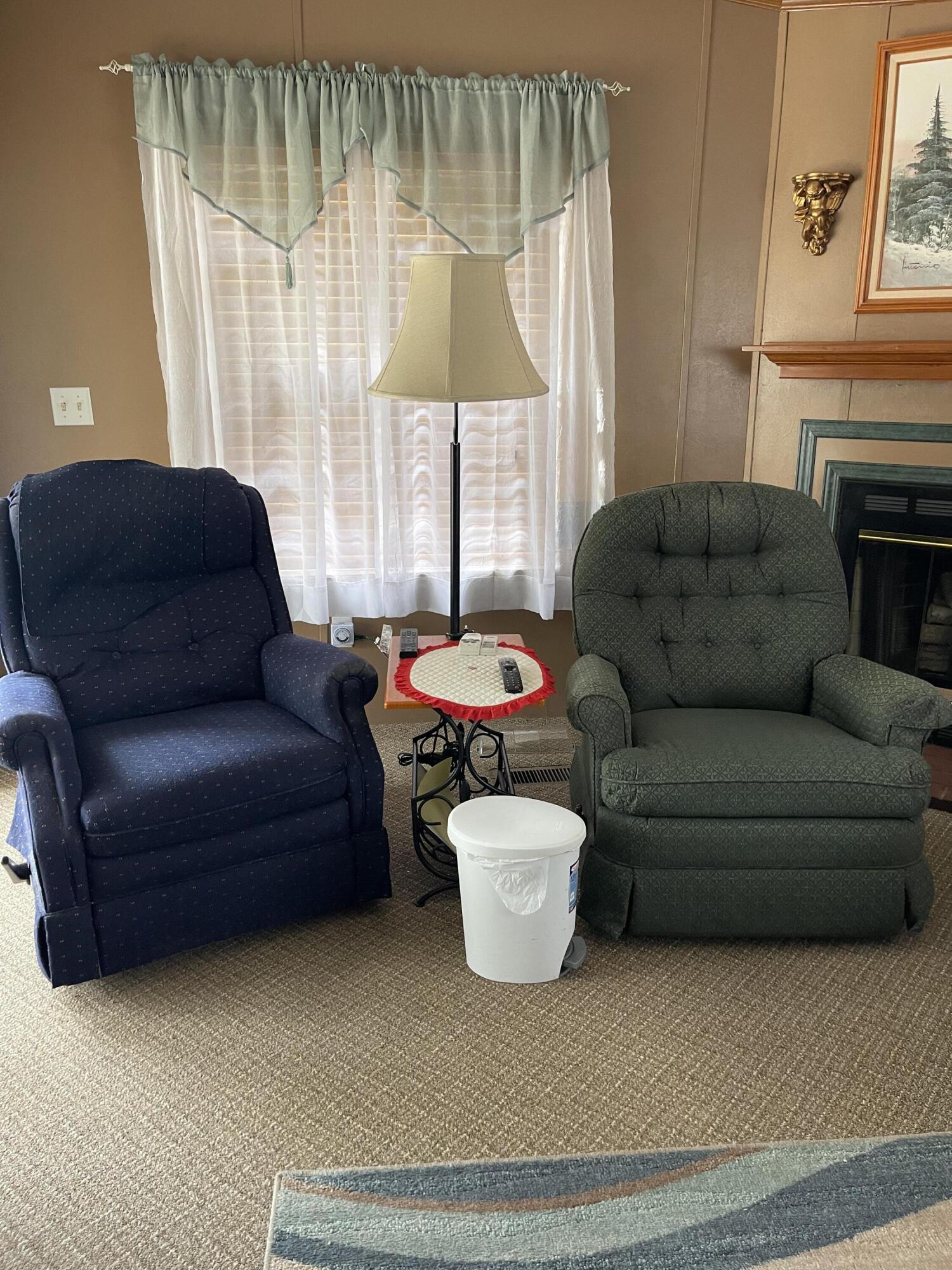Den with fireplace & both recliners and table stay