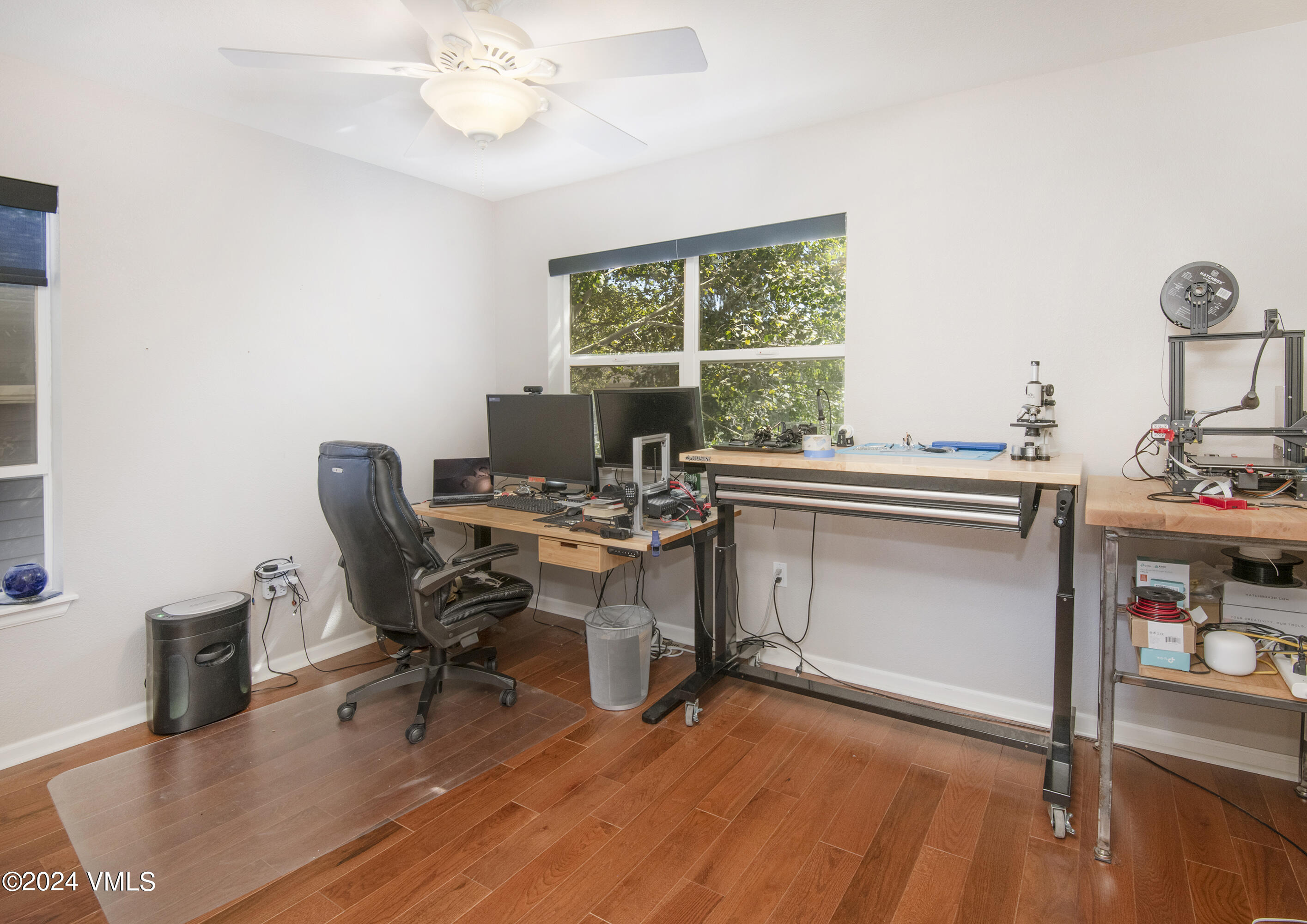 216 Mayer Street Eagle, CO 81631 - Photo 22 of 51 a view of a workspace with furniture and a window