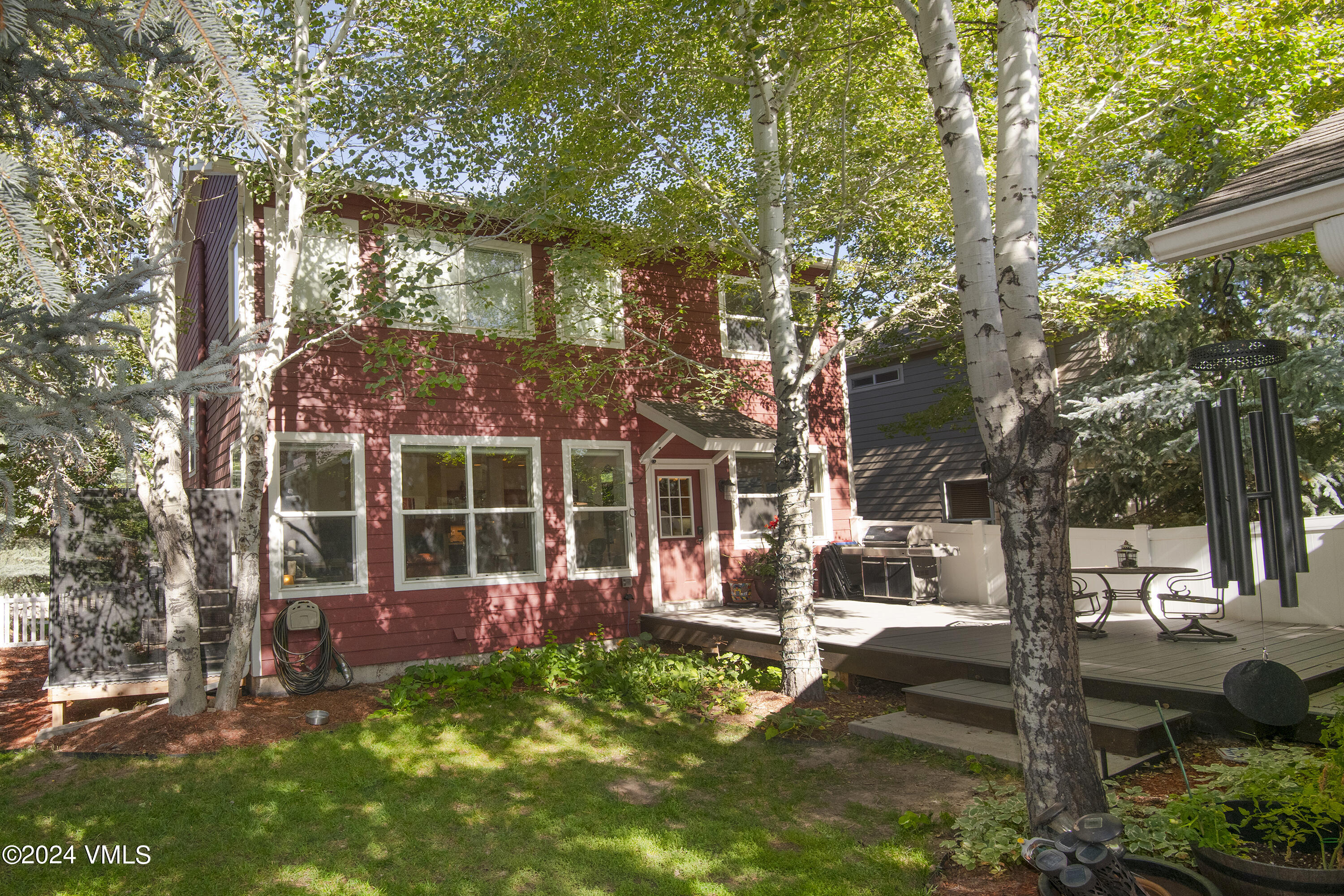 216 Mayer Street Eagle, CO 81631 - Photo 37 of 51 a view of a house with a backyard