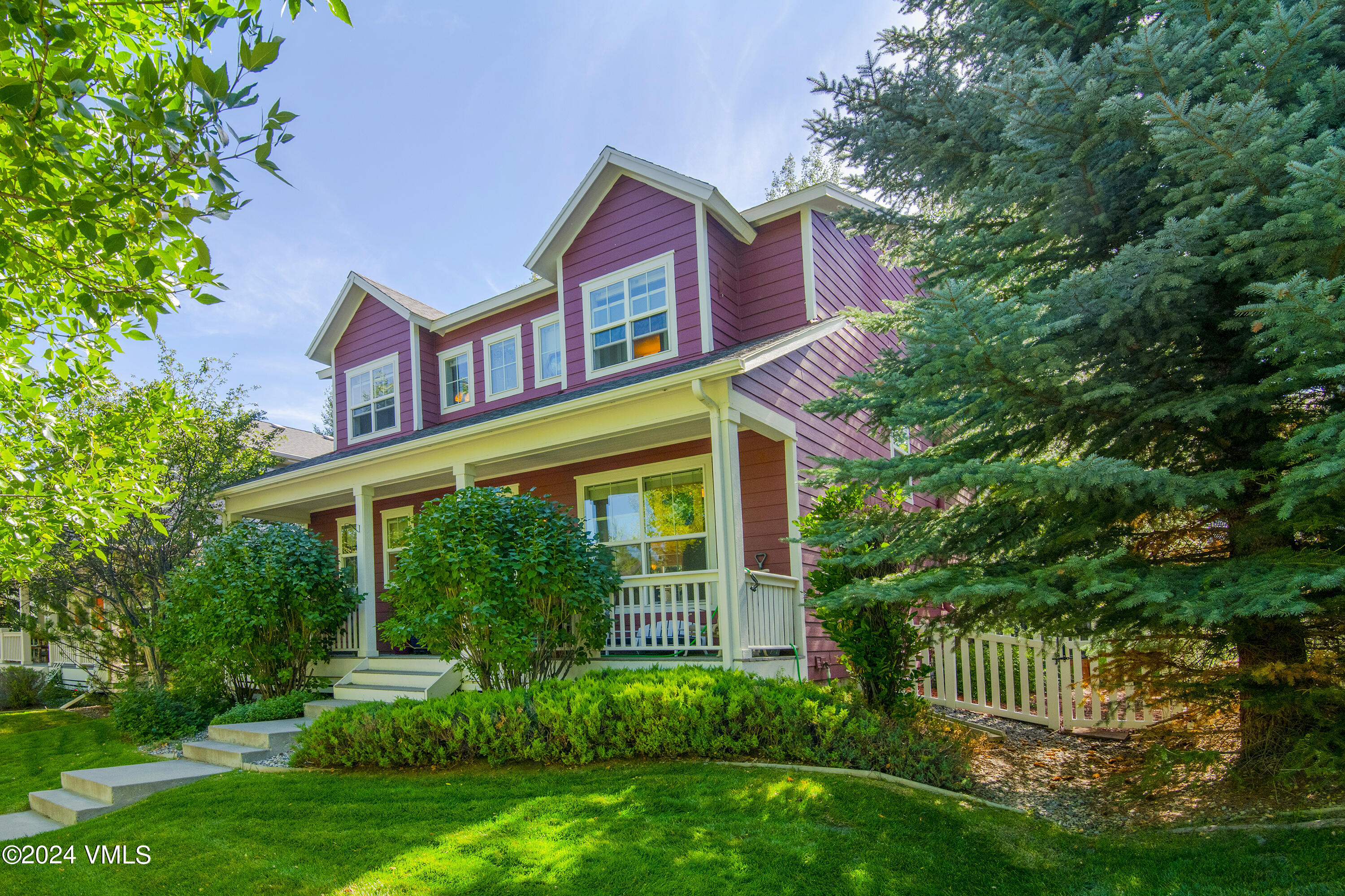 216 Mayer Street Eagle, CO 81631 - Photo 42 of 51 a front view of a house with garden