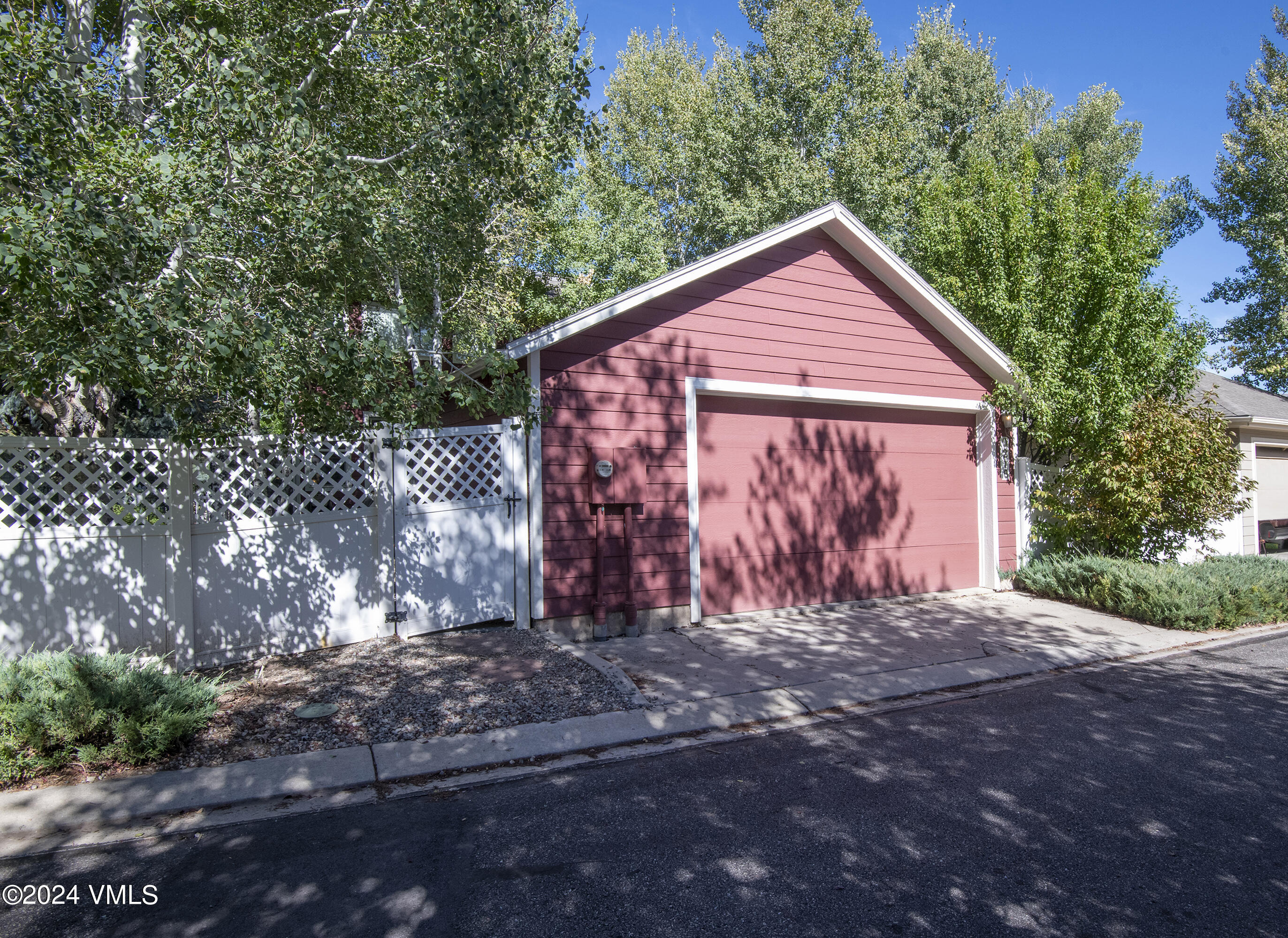 216 Mayer Street Eagle, CO 81631 - Photo 43 of 51 a view of a small house with a tree in the background