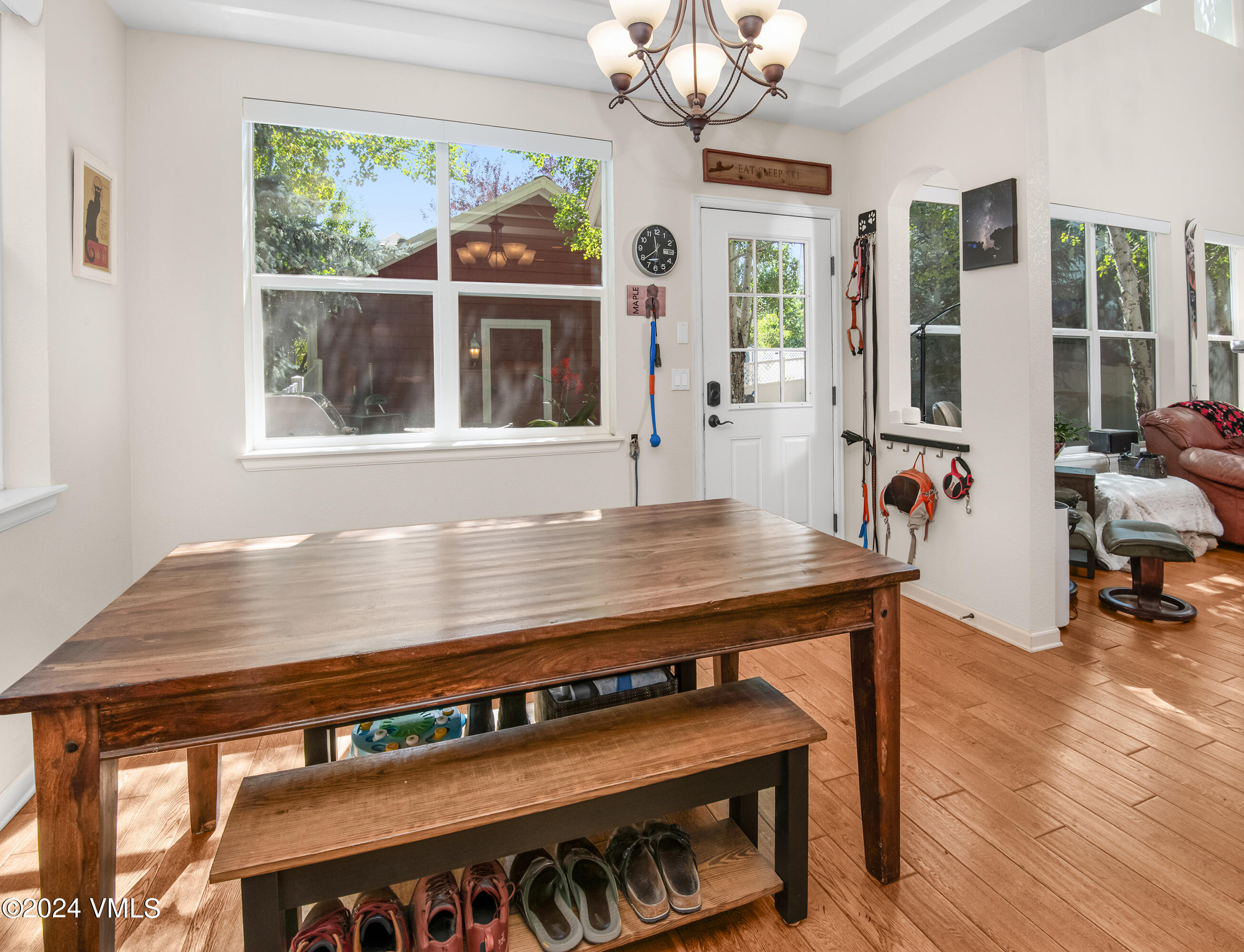 216 Mayer Street Eagle, CO 81631 - Photo 8 of 51 a view of a dining room with furniture window and wooden floor