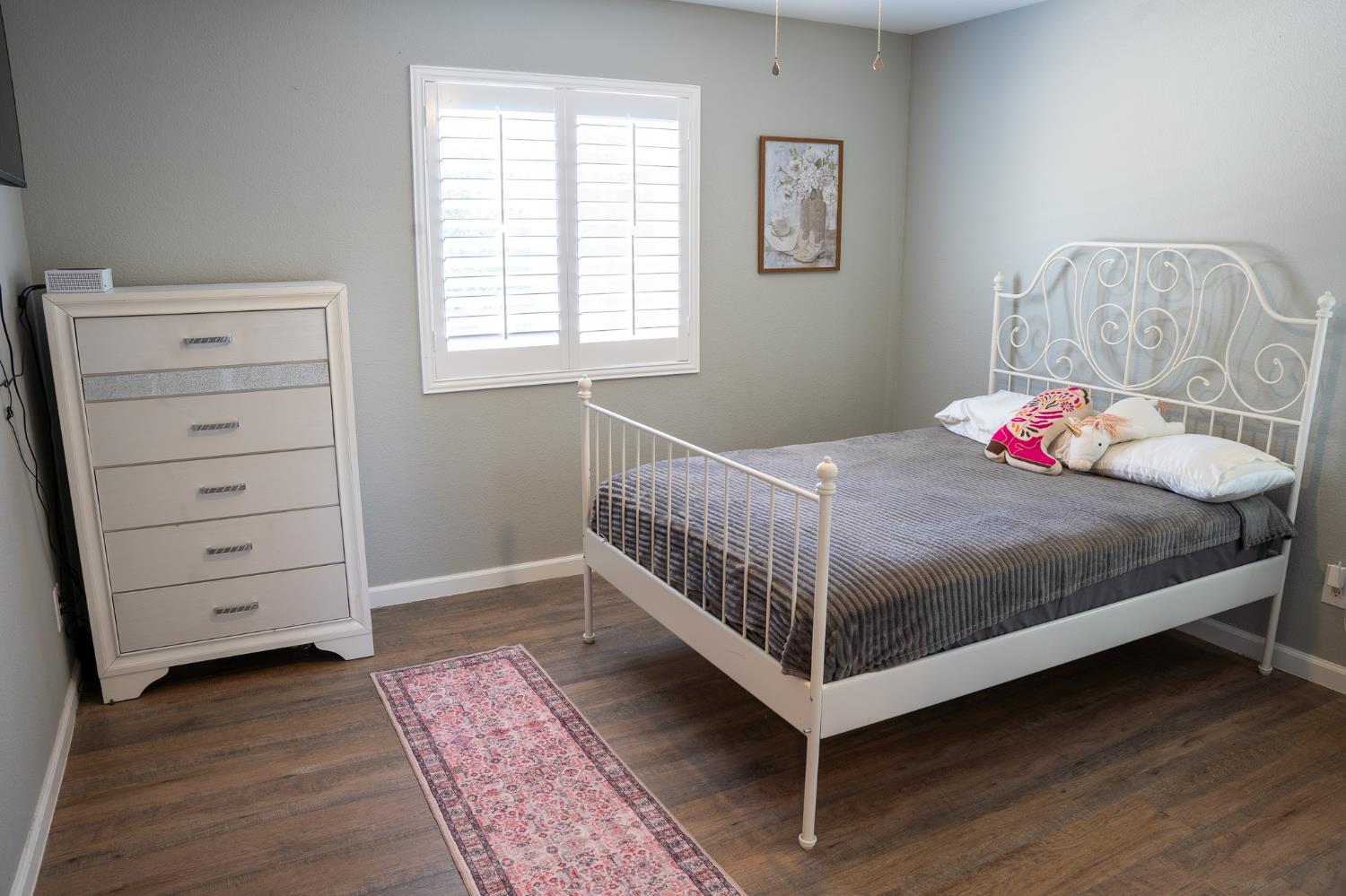 10961 Woolwich Way Mather, CA 95655 - Photo 17 of 28 a bedroom with a bed and a window