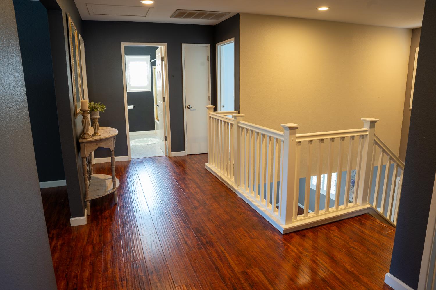 10961 Woolwich Way Mather, CA 95655 - Photo 19 of 28 a view of a hallway with wooden floor and staircase