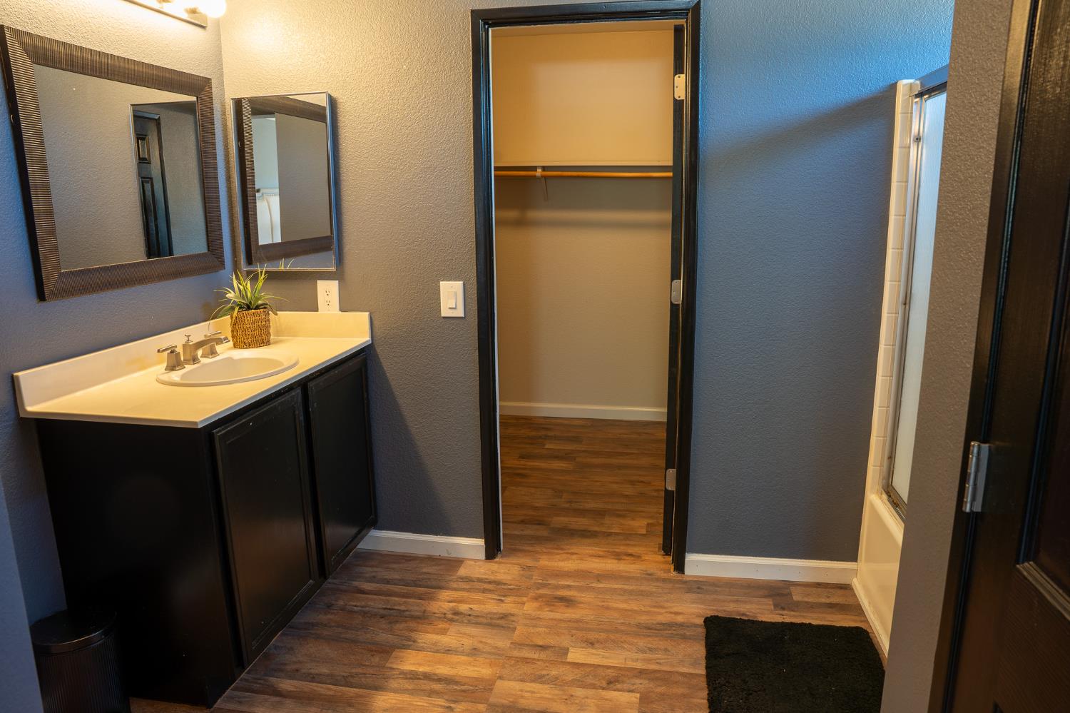 10961 Woolwich Way Mather, CA 95655 - Photo 21 of 28 a bathroom with a sink and a mirror