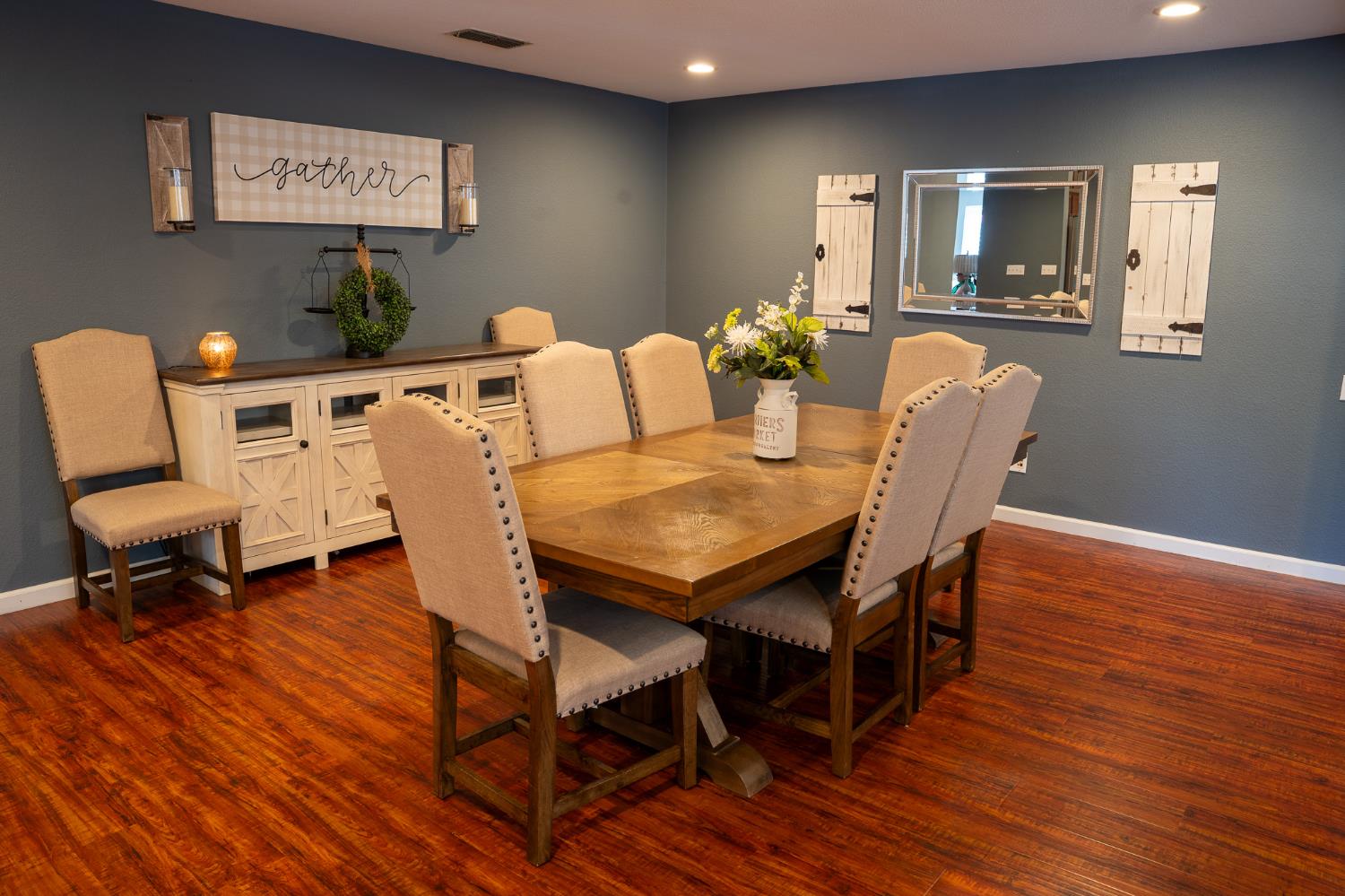 10961 Woolwich Way Mather, CA 95655 - Photo 5 of 28 a view of a dining room with furniture and wooden floor